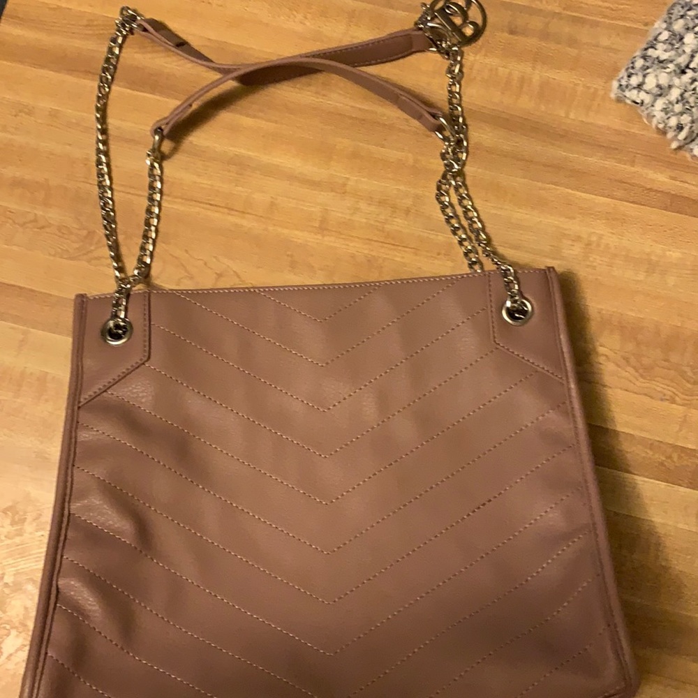 Dusty rose handbag.